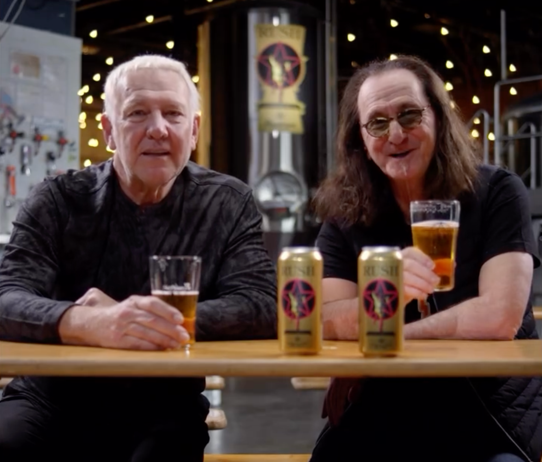 Alex Lifeson and Geddy Lee of Rush enjoying Rush Golden Ale